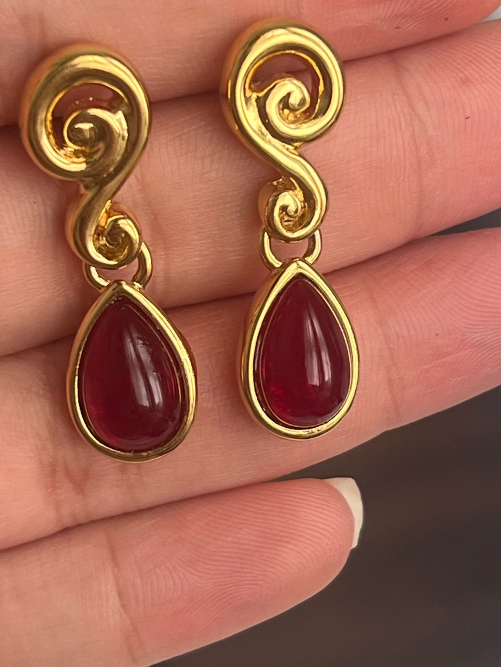Gold Swirl Drop Earrings with Deep Ruby-Red Teardrops
